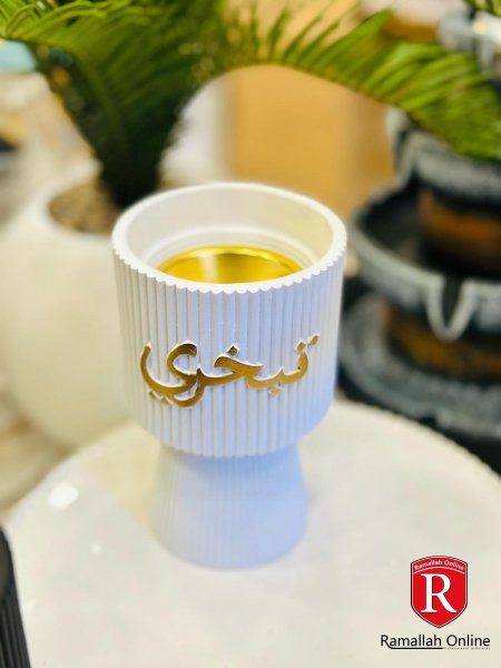 ابيض